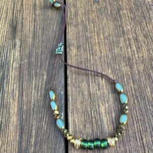 Bracelet lien perles de verre vertes